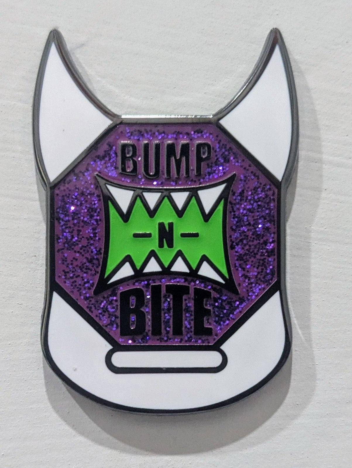 Bump-N-Bite LOGO PIN #23 Reverse *LE 35*